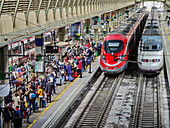 Seville, Spain, Apr 4 2025, A large number of travelers gather at Santa Justa Station in Seville, awaiting to board high-speed trains for their journeys.