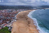 Aerial view of Nazare beach and cityscape, Portugal