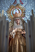 Virgen del Socorro, a 1618 work by Juan de Mesa, is carried in a paso de palio during the solemn processions of Holy Week in Seville.
