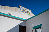 Olympic rings sign painted on a local sports center of Peniche