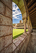 Codalet, France, Aug 22 2022, Visitors admire the beautiful Romanesque cloister, surrounded by lush greenery and historic architecture in Codalet, Languedoc-Roussillon.