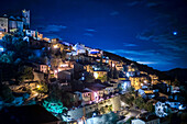 Charming night view of Eus, located in Languedoc-Roussillon, France, under a starry sky.