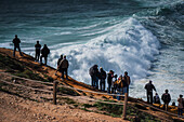 Big wave surfing in Praia do Norte (North Beach), listed on the Guinness World Records for the biggest waves ever surfed, formed under the influence of the Nazare Canyon, Portugal