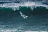 Big wave surfing in Praia do Norte (North Beach), listed on the Guinness World Records for the biggest waves ever surfed, formed under the influence of the Nazare Canyon, Portugal
