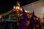 Procession of the Holy Sepulchre, Good Friday. Easter week. Santa Fe de Antioquia. Holy Week in Santa Fe de Antioquia. The celebration of this Catholic tradition in this municipality in the department of Antioquia, Colombia, is one of the most important in the country. The processions through its old cobblestone streets are a tradition dating back to the colonial era and are accompanied by the smoke of incense and the songs and prayers of the penitents who accompany them.