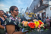 Holy Week in Santa Fe de Antioquia. The celebration of this Catholic tradition in this municipality in the department of Antioquia, Colombia, is one of the most important in the country. The processions through its old cobblestone streets are a tradition dating back to the colonial era and are accompanied by the smoke of incense and the songs and prayers of the penitents who accompany them.