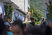Procession of the Risen Christ, Easter Sunday. Holy Week in Santa Fe de Antioquia. The celebration of this Catholic tradition in this municipality in the department of Antioquia, Colombia, is one of the most important in the country. The processions through its old cobblestone streets are a tradition dating back to the colonial era and are accompanied by the smoke of incense and the songs and prayers of the penitents who accompany them.