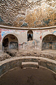 The frgidarium in the Stabian Baths, Building VII.1.8, in the ancient Roman ruins of Pompeii, Italy.