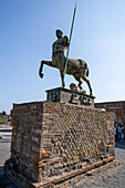 The sculpture 'Centauro' by Polish sculptor Igor Mitoraj in the forum of the ancient Roman ruins of Pompeii in Italy.
