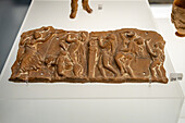 A terra cotta panel with a Dionysian scene in the National Archaeological Museum of Naples, Naples, Italy. From Ruvo, circa 3rd Century B.C. Magna Graecia Collection.