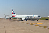 Airliners line up on the taxiway to take off at the Dallas Fort Worth International Airport near Dallas, Texas.