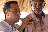 Man playing ocarina. Ocarinas and gaitas. Traditional wind instruments of indigenous origin from the Zenú culture.
