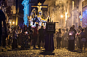 Procession of the Holy Sepulchre, Good Friday. Easter week. Santa Fe de Antioquia. Holy Week in Santa Fe de Antioquia. The celebration of this Catholic tradition in this municipality in the department of Antioquia, Colombia, is one of the most important in the country. The processions through its old cobblestone streets are a tradition dating back to the colonial era and are accompanied by the smoke of incense and the songs and prayers of the penitents who accompany them.