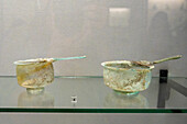 Free-blown glass ladles or trullae in the Vesuvian Life Gallery, National Archaeological Museum of Naples, Naples, Italy. From 1st Century Pompeii.