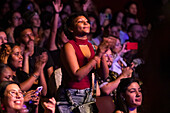 Spectators enjoying the artists' performances at the Pablo Tobón Uribe theater.