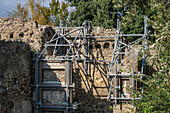 Metal frameworks to support and stabilize the ancient Roman ruins of Pompeii in Italy.