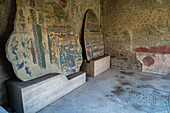 Mosaics from the Suburban Baths on display in Building VII.7.2, in the ancient Roman ruins of Pompeii, Italy.