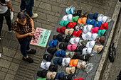 An outdoor open market under the Metro rail line in downtown Medellin, Colombia.
