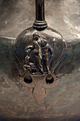 Detail of a 1st Century bronze jar in the Vesuvian Life Gallery, National Archaeological Museum of Naples, Naples, Italy.