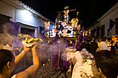 Procession of the Holy Sepulchre, Good Friday. Easter week. Santa Fe de Antioquia. Holy Week in Santa Fe de Antioquia. The celebration of this Catholic tradition in this municipality in the department of Antioquia, Colombia, is one of the most important in the country. The processions through its old cobblestone streets are a tradition dating back to the colonial era and are accompanied by the smoke of incense and the songs and prayers of the penitents who accompany them.