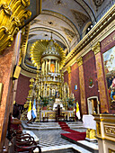 The ornate main altarpiece of the Cathedral of Salta in Salta, Argentina.
