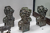 Bronze busts of a faun in the Vesuvian Life Gallery, National Archaeological Museum of Naples, Naples, Italy. Used to decorate furniture in a house in Pompeii.