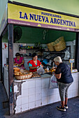 A woman at a bakery shop in a market in Santiago del Estero, Argentina.