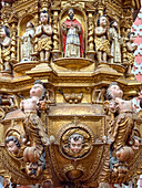 The ornately-carved pulpit in the nave of the Basilica of Our Lady of Mercy, Quito, Ecuador.