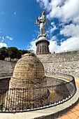 The Virgin of Panecillo or Virgin of Quito, an aluminum statue on El Panecillo Hill in Quito, Ecuador. In front is the Spanish-colonial Olla del Panecillo, a water cistern.