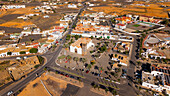 Aerial view of La Oliva town with traditional architecture and palm trees, Fuerteventura Island, Canary Islands, Spain.