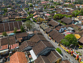 Aerial view of traditional rooftops and architecture in a charming historic town, Minh An, Quang Nam, Vietnam.