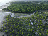 Aerial view of serene and untouched Guliyakhali Sea Beach with lush mangroves and greenery, Chittagong, Bangladesh.