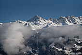 Aerial view of majestic snow-covered peaks and dramatic alpine landscape, Verbier, Valais, Switzerland.