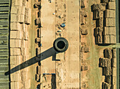 Aerial view of industrial brick fields with factories and smokestacks amidst pollution, Suti Para Union, Dhamrai, Dhaka, Bangladesh.