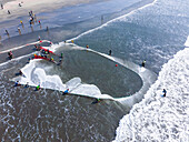 Cox'S Bazar, Bangladesh - 08 February 2024: Aerial view of colorful fishing boats along the golden sands and turquoise waters of the coastline, Cox's Bazar, Cox's Bazar, Bangladesh.