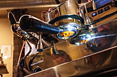 A look at an espresso machine that brews speciality coffee. The rich, golden espresso flows smoothly and emphasises the art and precision of coffee preparation.