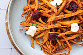 Crispy baked sweet potato sticks, seasoned with aromatic spices, served with creamy aioli and spicy beet ketchup A perfect balance of flavour and texture