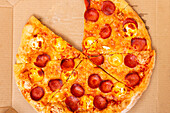 A delicious pepperoni pizza with melted cheese lies invitingly in an open box, perfect for a cosy evening at home Ideal comfort food to relax and enjoy