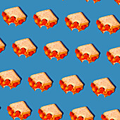 A creative pattern of sandwiches with bright red flower fillings against a light blue background. Perfect for food-themed designs and creative projects.