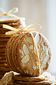 Fresh, crispy baked almond biscuits in a biscuit tin