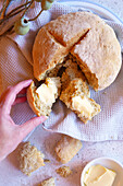 Traditional Australian damper bread with Wattleseed flavour, known for its thick, crispy outside and dense, doughy inside.