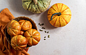 Pumpkin roll yeast bread with spices on a linen background. Thanksgiving food concept. Autumn concept, top view, Halloween