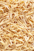 Layout of Italian homemade tagliatelle pasta