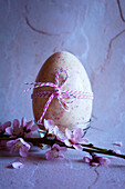Strawberry and white chocolate Easter egg close-up.