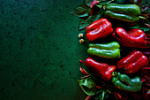 Red and green Capsicum peppers. Horizontal orientation with copy space.