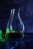 Decanting red wine concept shown with swan style decanter which is suitable for bold wine such as Shiraz Cabernet.