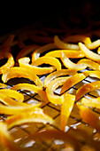 Candied yuzu citrus peel on a chilled shelf