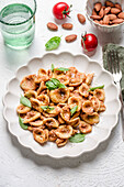 Orecchiette pasta with tomato and almond pesto (Trapanese)