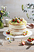 Strawberry cake with spring flower decoration