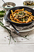 Stroganoff with pork, mushrooms and finger noodles as a side dish
